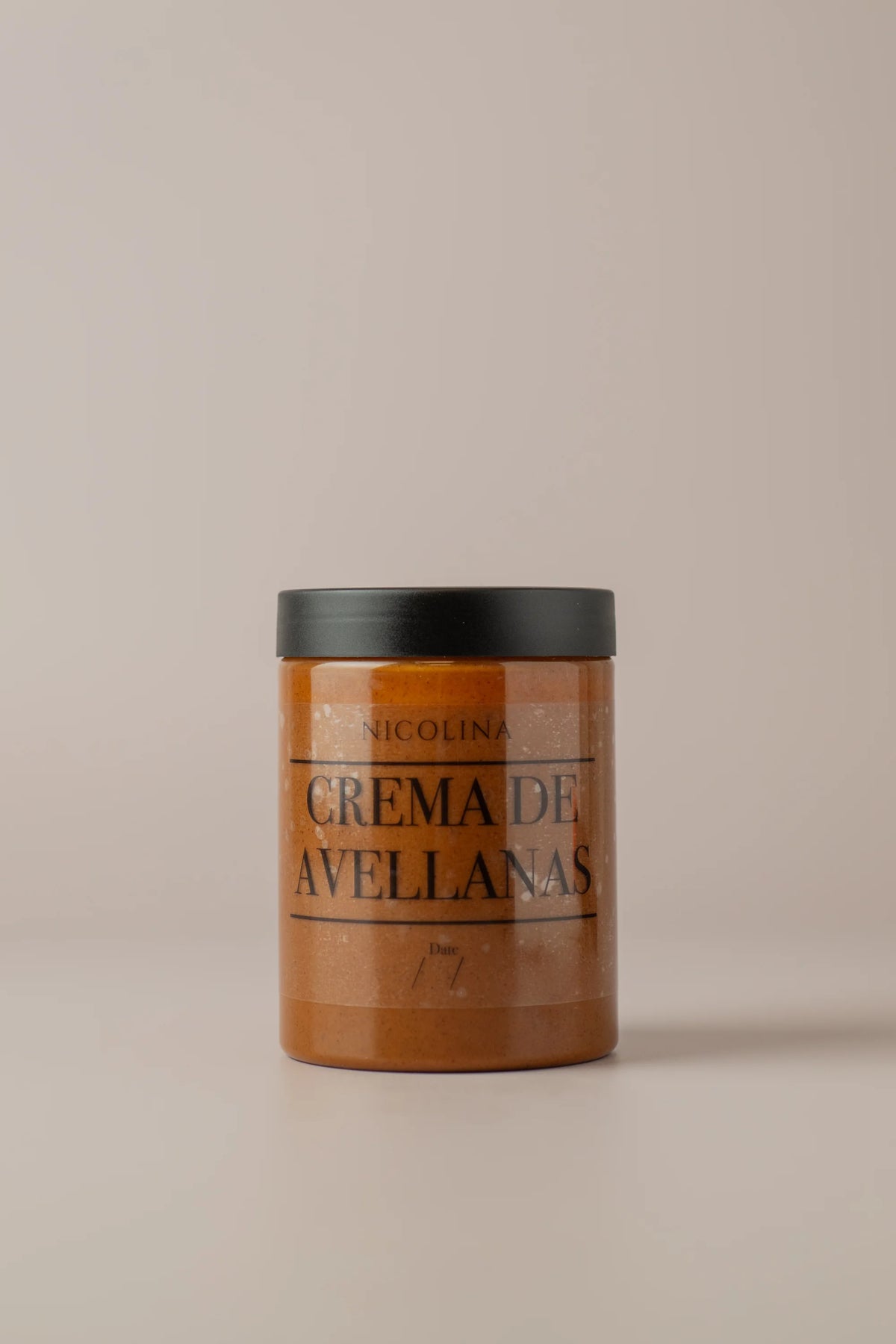 Bote de crema de avellanas Nicolina sin gluten y sin azúcar con textura cremosa y sabor intenso a fruto seco.
