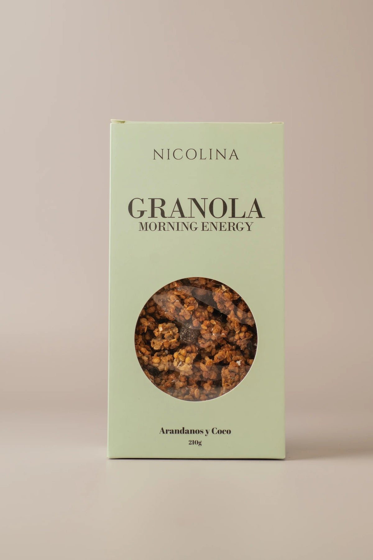 Caja de granola de arándanos y coco sin gluten y sin lactosa de NICOLINA Madrid, presentada en packaging premium.
