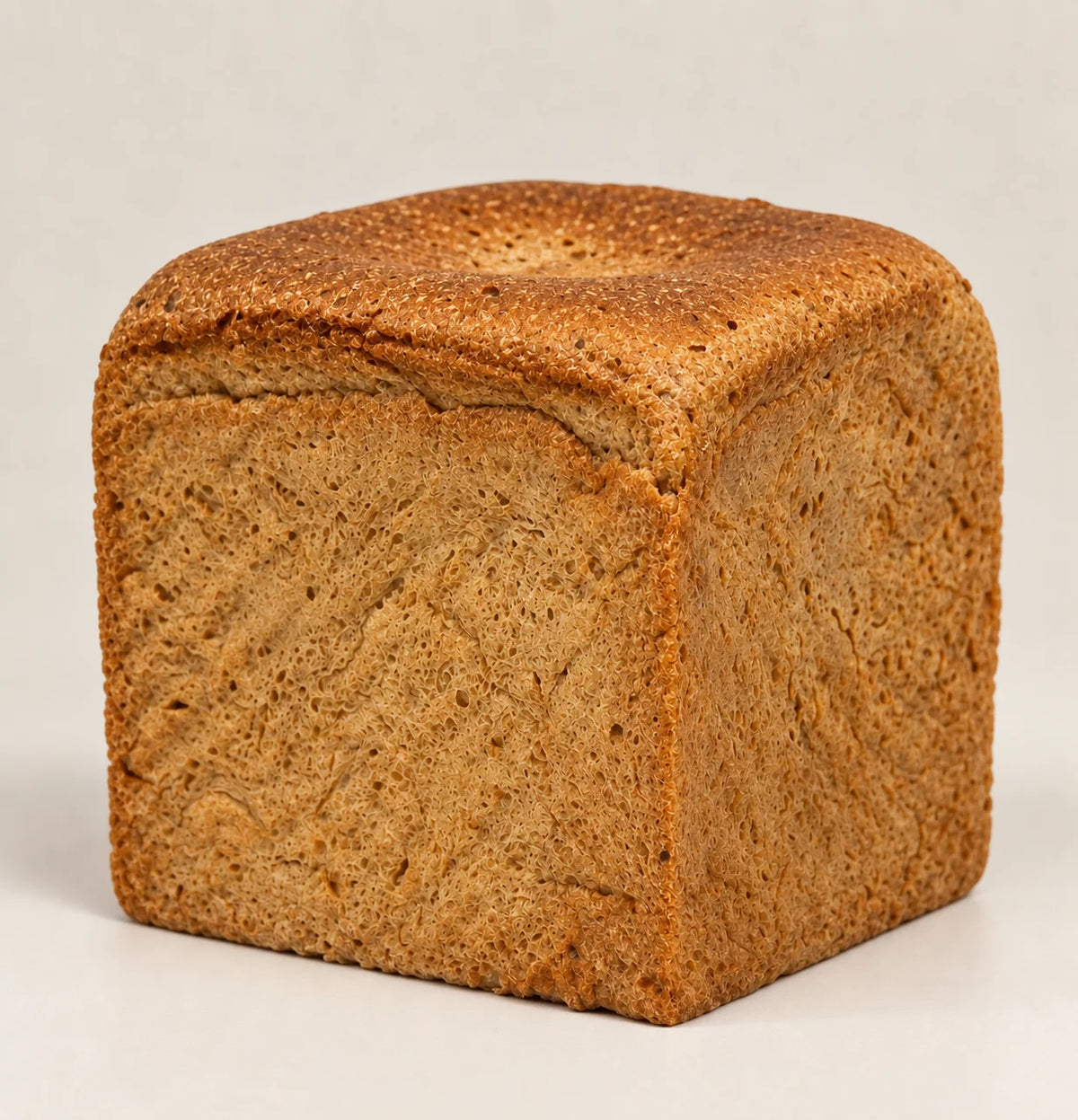 Pan de molde blanco sin gluten, sin lactosa y sin azúcar de NICOLINA, de corteza dorada y miga tierna, en Madrid.
