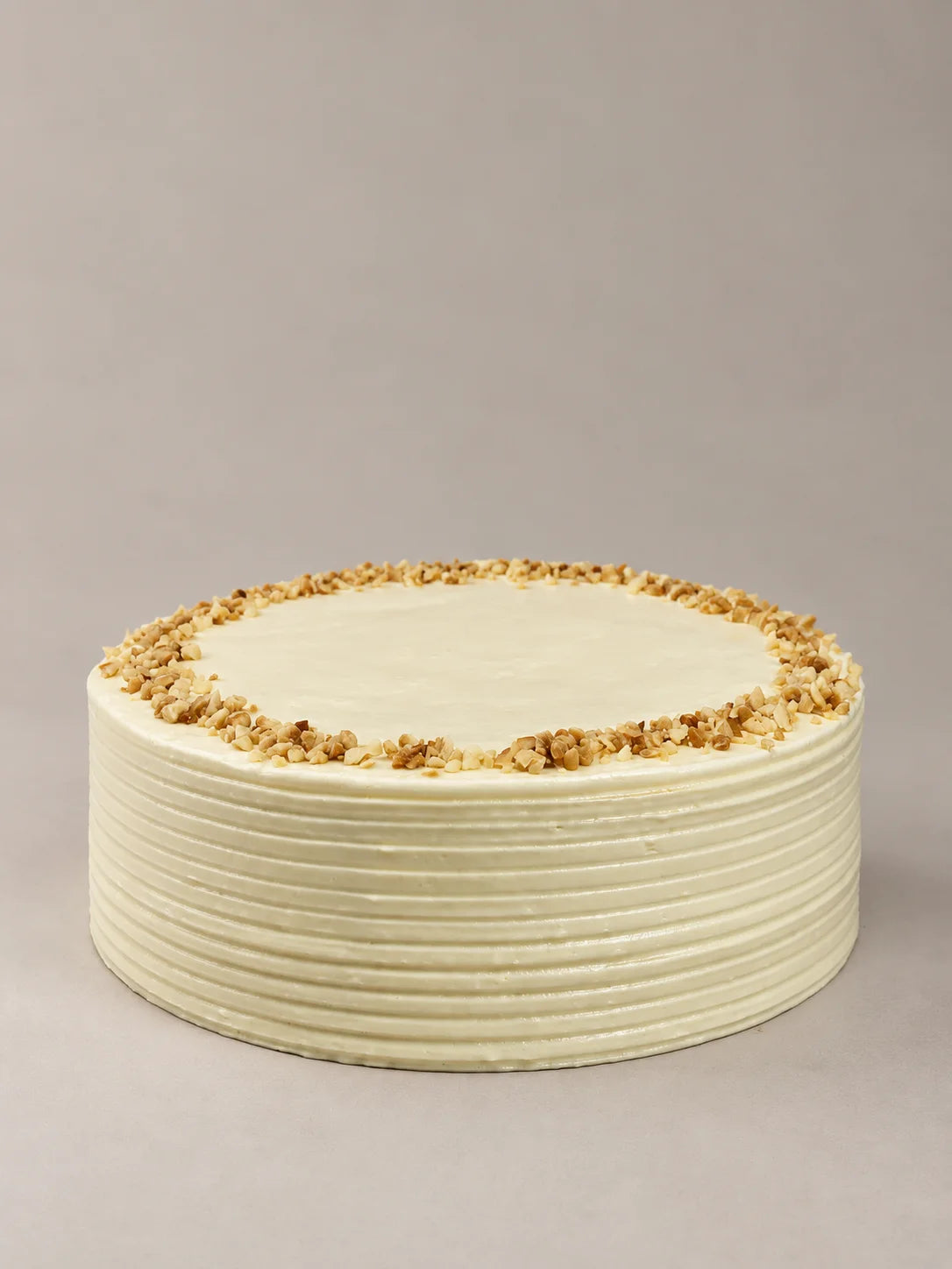 Tarta de zanahoria sin gluten y sin lactosa de NICOLINA Madrid, con crema suave de queso y cobertura artesanal.
